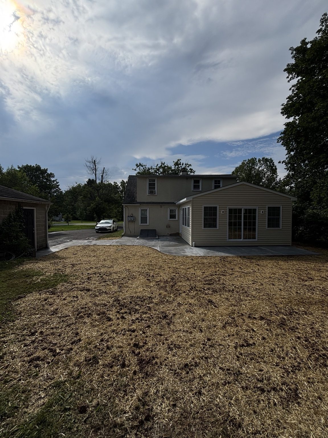 Residential Concrete Patio, Walkways & Bilco Door Stucco project photo 1