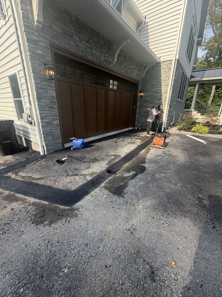 Gutter Drainage Installation & Asphalt Repair project photo 4